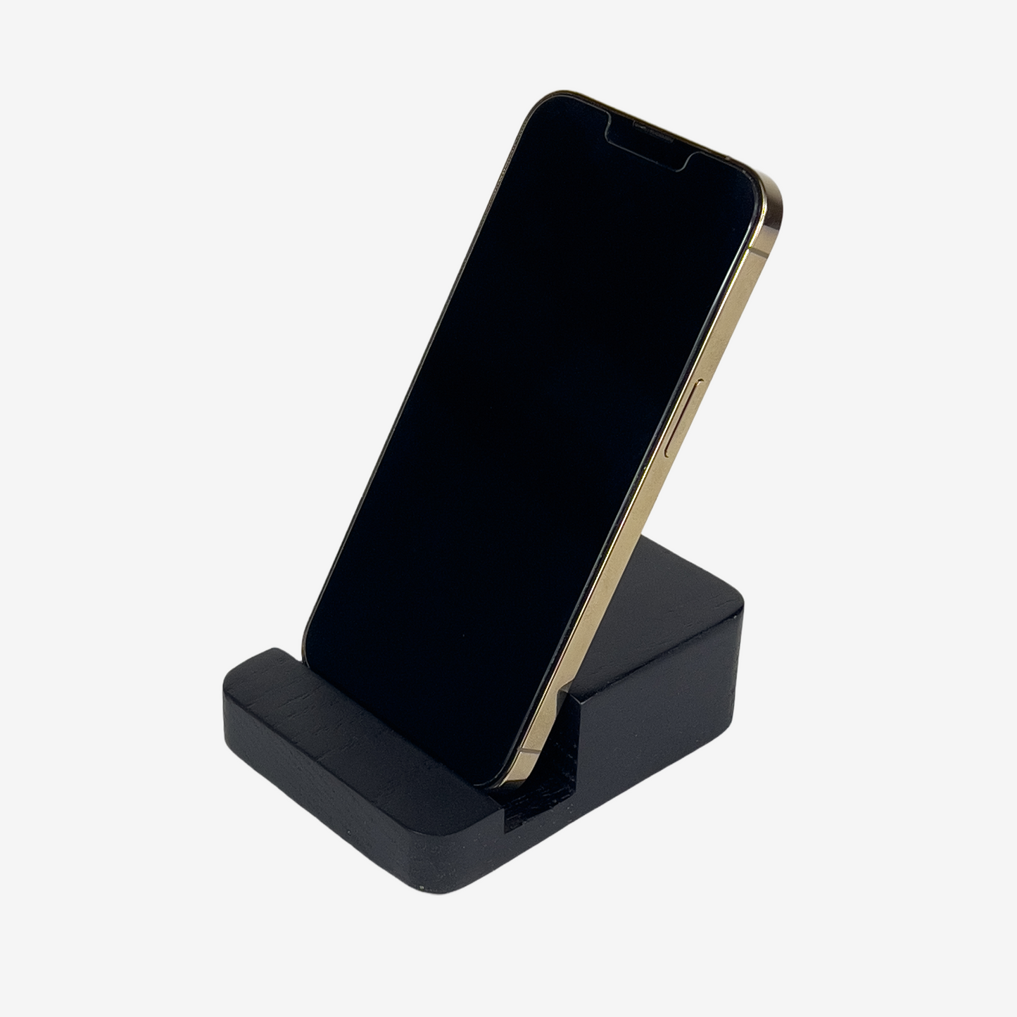 Lux Navia black wooden phone stand holding a smartphone, with the image taken from the front, combining a minimalist aesthetic with practical functionality for any workspace or home.