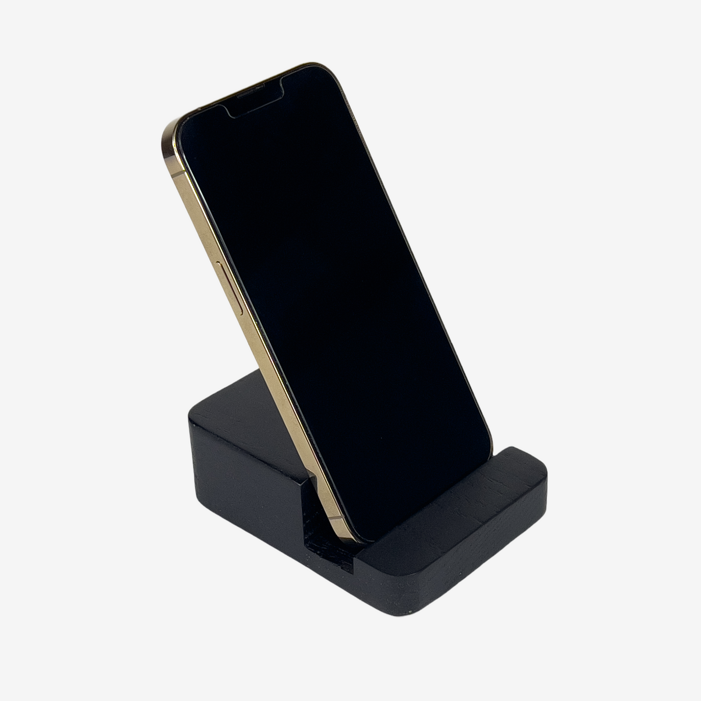 Lux Navia black wooden phone stand holding a smartphone, with the image taken from the front, combining a minimalist aesthetic with practical functionality for any workspace or home.