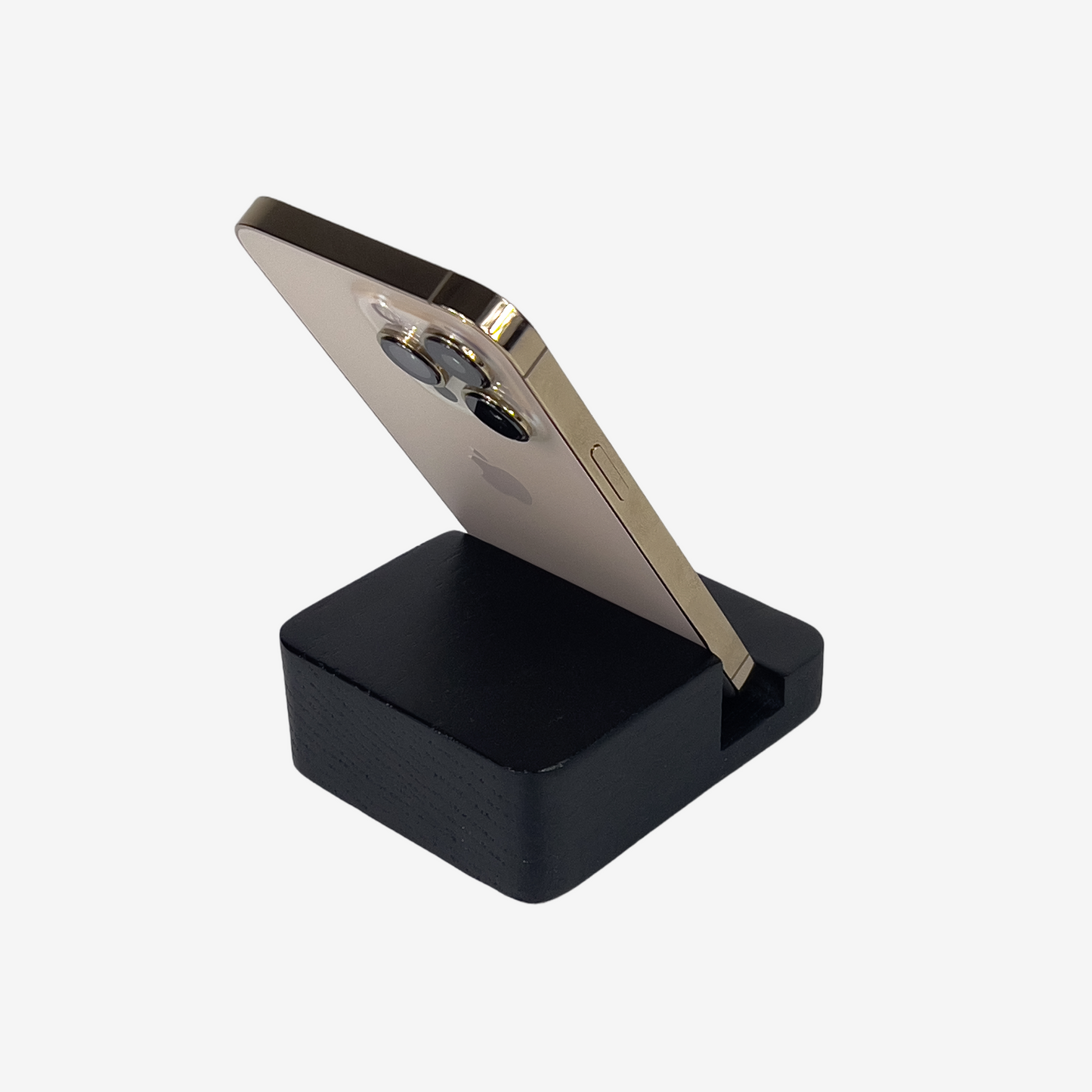 Lux Navia black wooden phone stand holding a smartphone, with the image taken from the back, combining a minimalist aesthetic with practical functionality for any workspace or home.