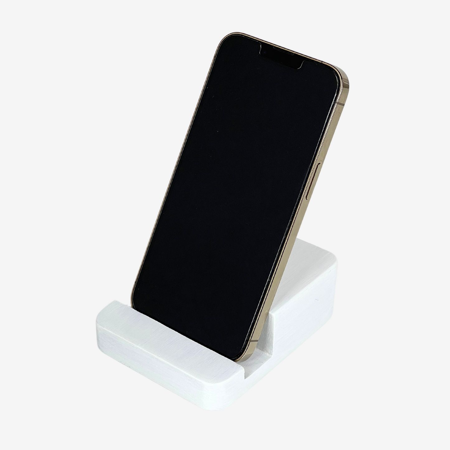 Lux Navia white wooden phone stand holding a smartphone, with the image taken from the front, combining a minimalist aesthetic with practical functionality for any workspace or home.