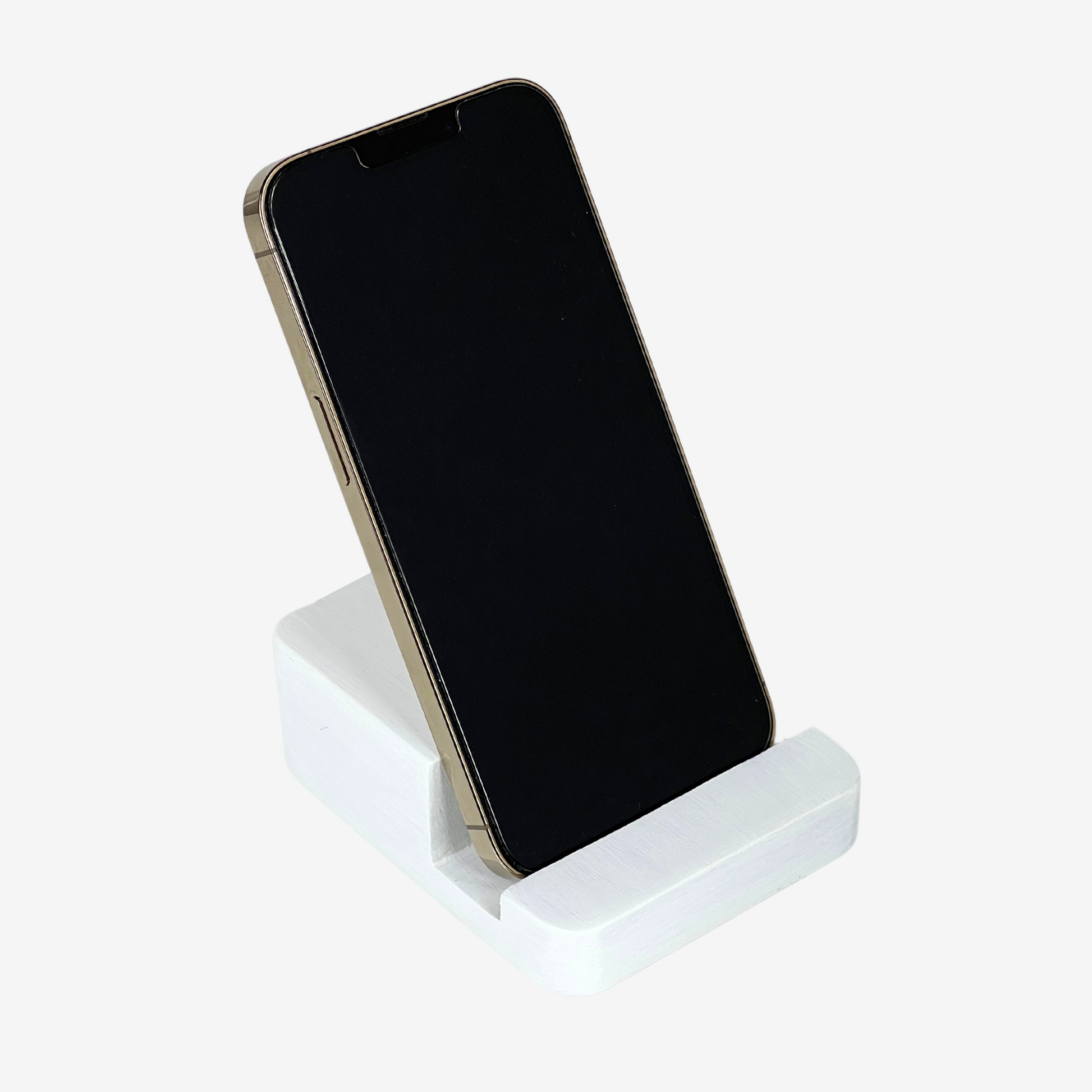 Lux Navia white wooden phone stand holding a smartphone, with the image taken from the front, combining a minimalist aesthetic with practical functionality for any workspace or home.